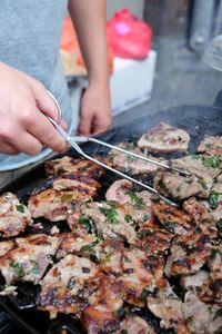 Close-up of man preparing food