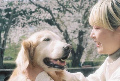 Portrait of woman with dog