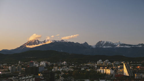 Triglav and julian alps in the background from ljubljana castle at sunset, slovenia.
