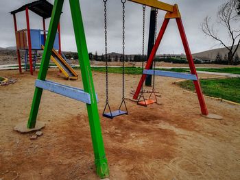 Empty swings in park