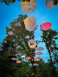 Low angle view of decoration hanging against sky