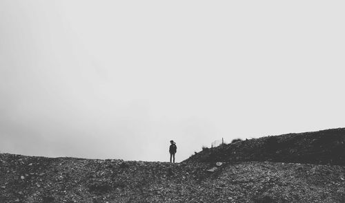 Full length of man on road against sky