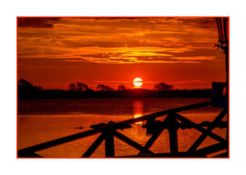 Scenic view of sunset over sea