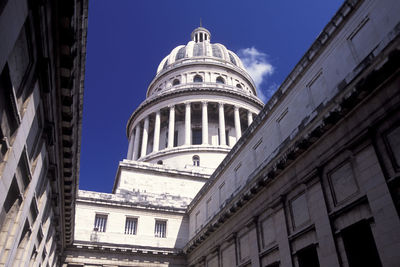 Low angle view of building against blue sky