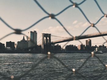 Low angle view of city at sunset