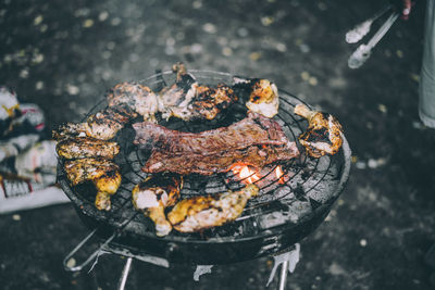 Close-up of meat on barbecue grill