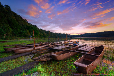 Scenic view of lake against sky during sunset