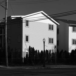 Street amidst buildings against sky