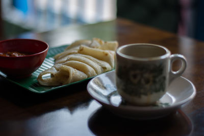 Close-up of tea cup on table