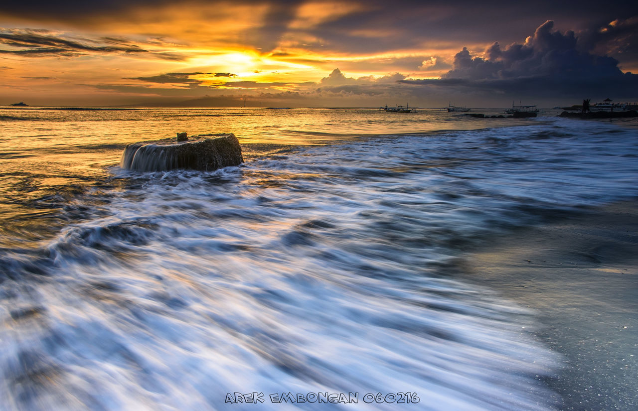 water, sea, sunset, scenics, sky, beach, beauty in nature, wave, tranquil scene, cloud - sky, tranquility, nature, shore, surf, horizon over water, idyllic, waterfront, motion, cloudy, outdoors