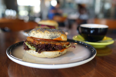 Close-up of burger in plate on table