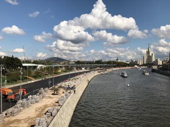 View of city against cloudy sky