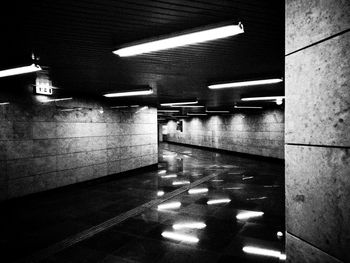 Shadow of people on illuminated subway station