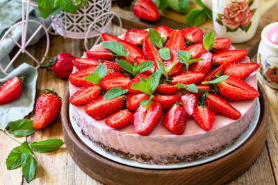 High angle view of strawberries in plate on table