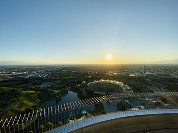 High angle view of buildings against sky during sunset