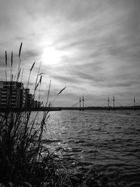 View of river against cloudy sky