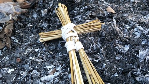 High angle view of cross on wood against temple