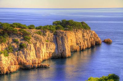 Scenic view of sea and rock formation