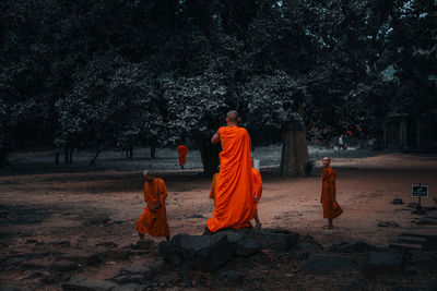 Rear view of people at temple