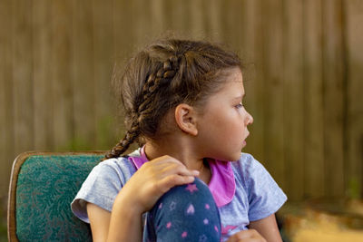 Portrait of a girl looking away