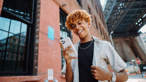 Young woman using mobile phone