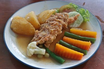 High angle view of breakfast served on table