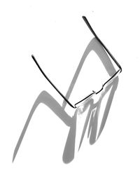 High angle view of electric lamp against white background