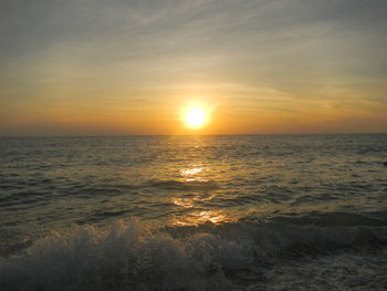 Scenic view of sea at sunset