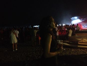 People enjoying at concert