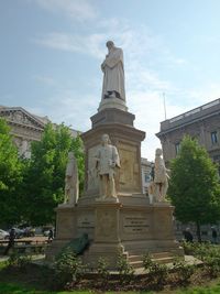 Low angle view of statue against sky