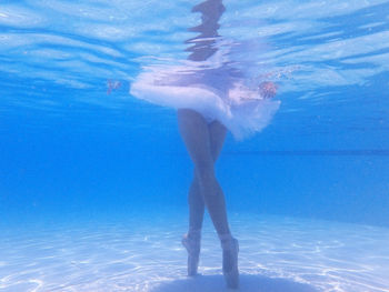 Woman swimming in pool