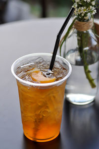 Close-up of beer glass on table