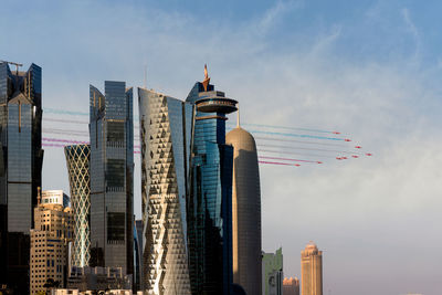 Low angle view of skyscrapers against sky