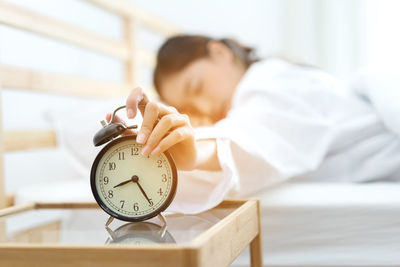 Portrait of a woman sleeping on table