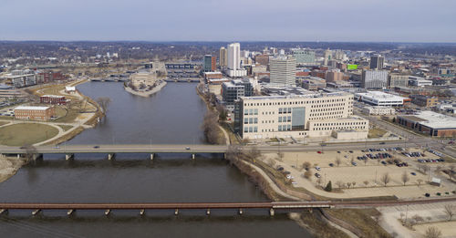 High angle view of river amidst buildings in city