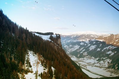 Scenic view of mountains against sky during winter