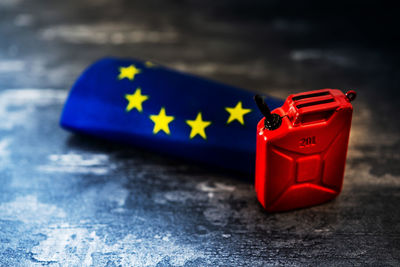 Close-up of miniature flag on table