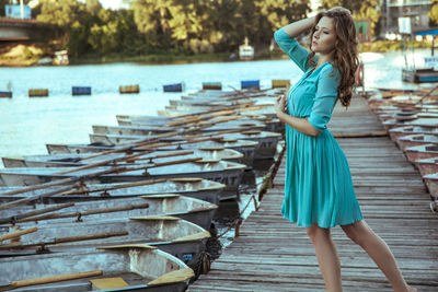 Full length of woman standing in water