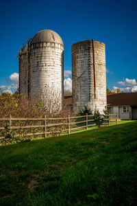 Built structure on field against clear sky