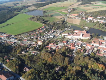 High angle view of crowd on field in city