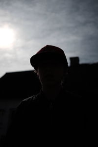 Close-up of man against sky