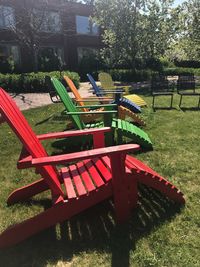 Empty chairs in park