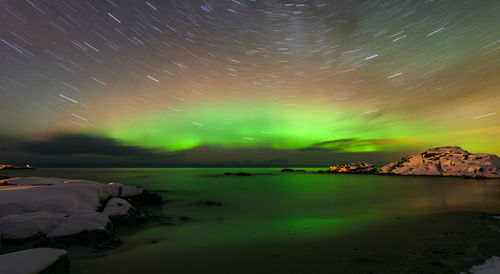 Scenic view of sea against sky at night