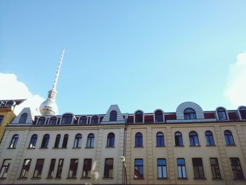 Low angle view of building by fernsehturm