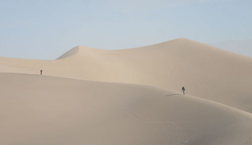 Scenic view of desert against clear sky