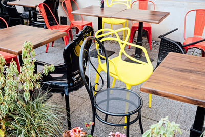 Close street cafe with empty chairs and tables. closed cafe, small business closure crisis