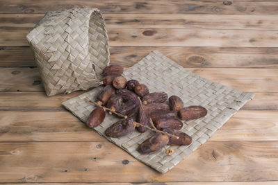 High angle view of bread on wooden table