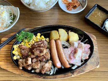 Pork hotdogs steak and grill , sashimi, with japan , korea foods style