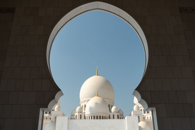 Low angle view of buildings against clear sky