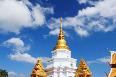 Low angle view of cathedral against cloudy sky